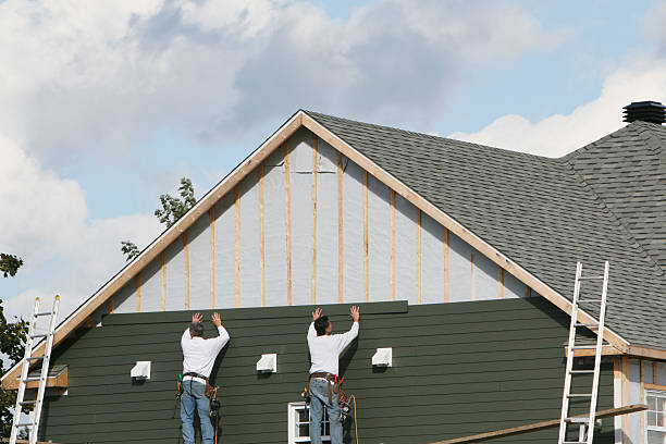 Professional Siding technician working in Fountain, NC